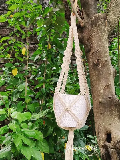 This macrame plant hanger is a great way to display your plants in a stylish and trendy way. It fits pots of 4-7 inches and is customizable.