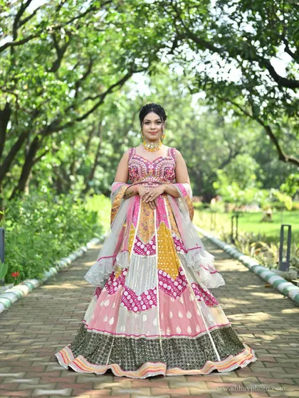 A full-length shot of the multi-colored lehenga, showing its grand flare and vibrant patchwork design.