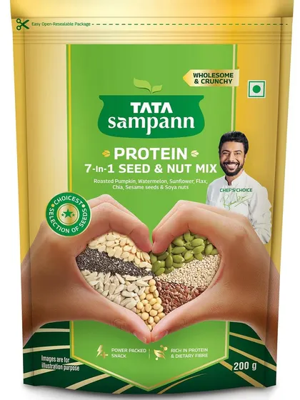 This packaging simulation for Tata Sampann's 7-in-1 Seed & Nut Mix uses hands forming a heart shape to convey health and care. It's a powerful visual metaphor for a product focused on wellness.