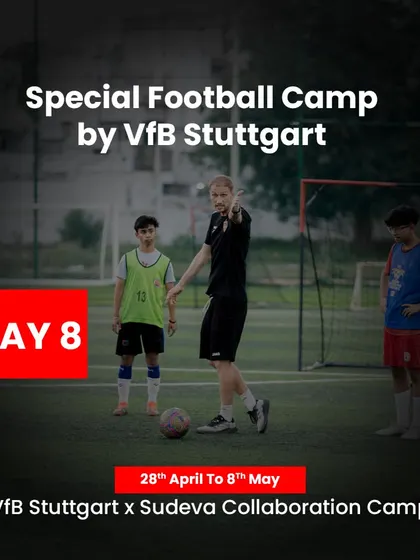 A VfB Stuttgart coach provides one on one guidance to a young player during a special collaboration camp. This personalized attention to technique and form is a core part of our European masterclass, ensuring every player understands the fundamentals at an elite level.