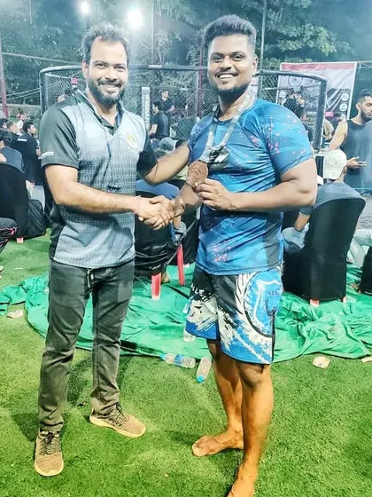 Shaking hands after winning a bronze medal at the MMA National Federation Championship. Respect for your fellow competitors is a core value in martial arts.