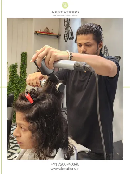 We've got the perfect blow-dry for you. Here, our stylist uses a Dyson and round brush to create a bouncy, voluminous, and sleek finish.