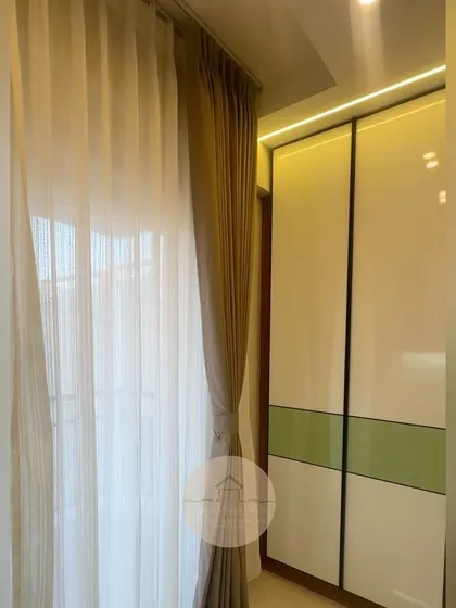 A collection of our custom wardrobe designs, showcasing different finishes like glass, laminate, and wood, as well as various internal configurations to meet the specific storage needs of our clients.