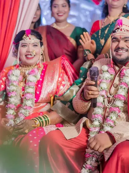 The couple interacts with their guests during the ceremony, their happy faces showing the love and support surrounding them.