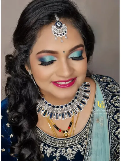 Want to learn how to use bold colors? In my classes, we explore fun looks like this vibrant blue eyeshadow for a reception. I'll guide you on how to blend bright pigments confidently.
