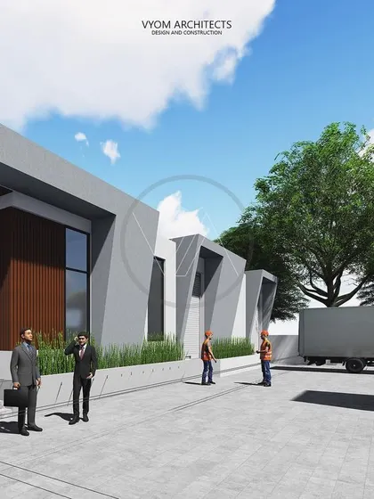 Another view of the AMR Dairy factory, showing the entrance and loading areas. The architecture remains clean and contemporary, proving that industrial buildings can also be well-designed.