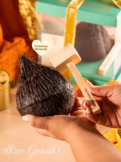 This customer-favorite Shree Ganesh Coconut Piñata comes with a small wooden hammer for the most satisfying smash. It's a joyful and delicious addition to your Ganpati celebrations.