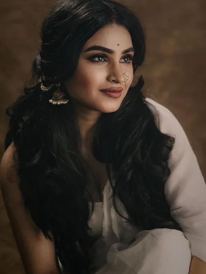 Another portrait from the same series, showcasing a soft and dreamy expression. The makeup is designed to be versatile, looking beautiful from every angle and in different lighting.
