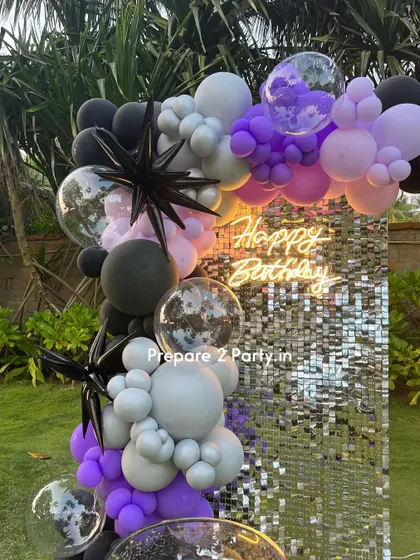 Celebrating 40 is a big deal. My designs for this milestone often include glamorous elements like sequin walls and neon signs, with customizable color palettes to suit any taste.