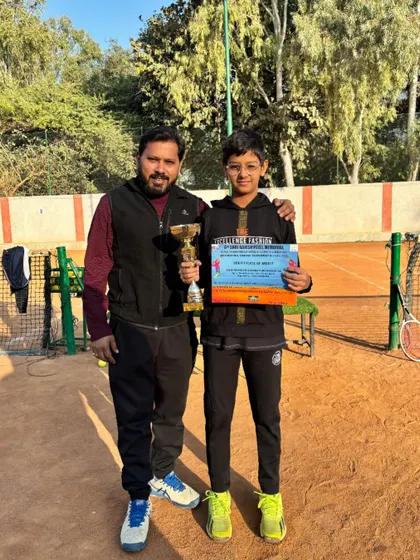 We build champions from a young age. Here I am with Tyakshi Lather, the winner of the AITA Under 12 Championship Series. Her victory is a testament to our focus on foundational skills and competitive mindset.