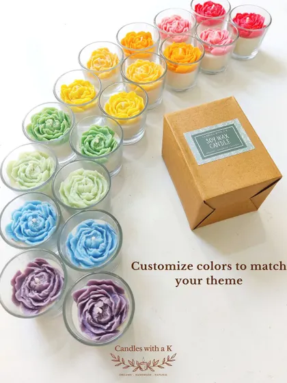 A beautiful display of peony votive candles in a rainbow of colors, showcasing how clients can customize colors to match their theme.
