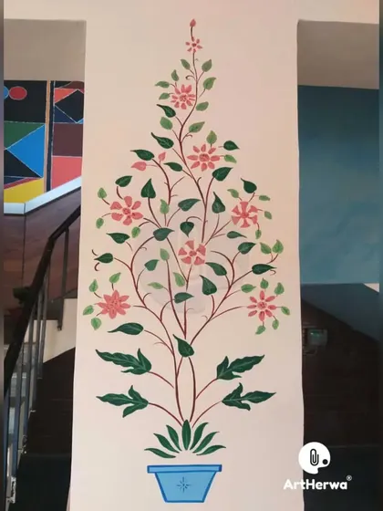 A simple and elegant floral wall art piece in Gurgaon. This traditional 'tree of life' motif is painted in a clean, minimalist style, perfect for a modern home.