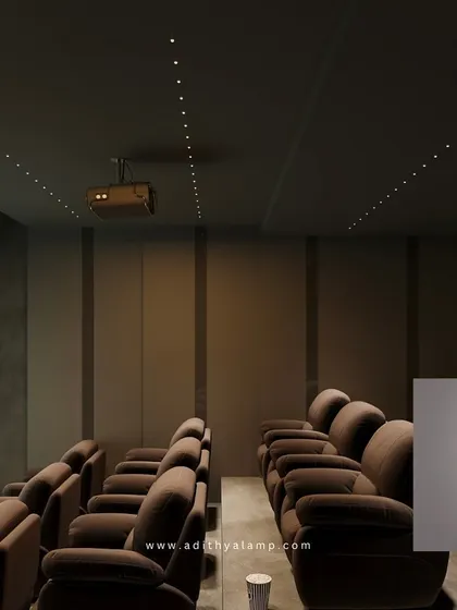 A variety of our architectural ceiling lights, shown here in a home theater setting. These small, powerful lights provide precise, low-glare illumination, perfect for creating a cinematic experience or highlighting architectural details.