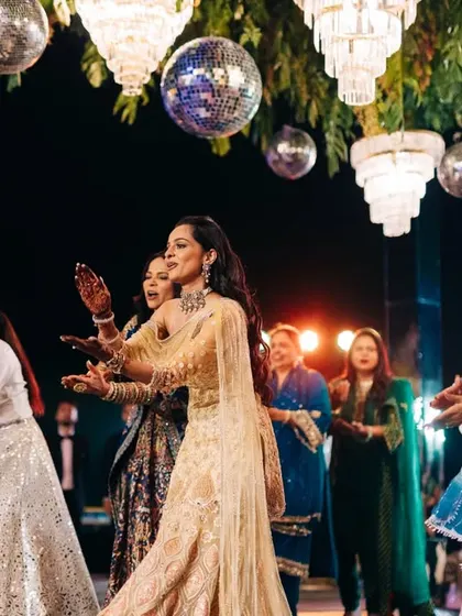 The bride and her squad in a beautiful, synchronized move. Even though they learned online, their performance was flawless.