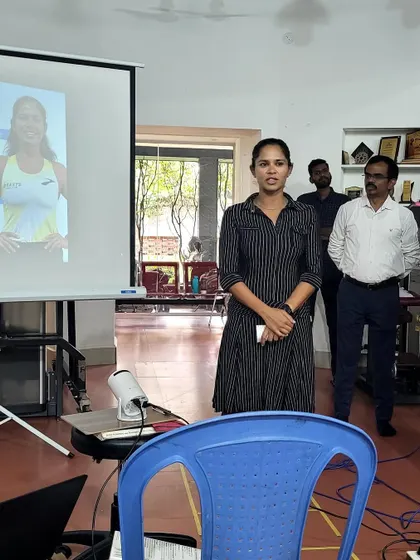 Presenting at the workshop. I emphasize that a good physiotherapist is a key member of any serious athlete's support team, helping with assessment, prevention, and rehabilitation.