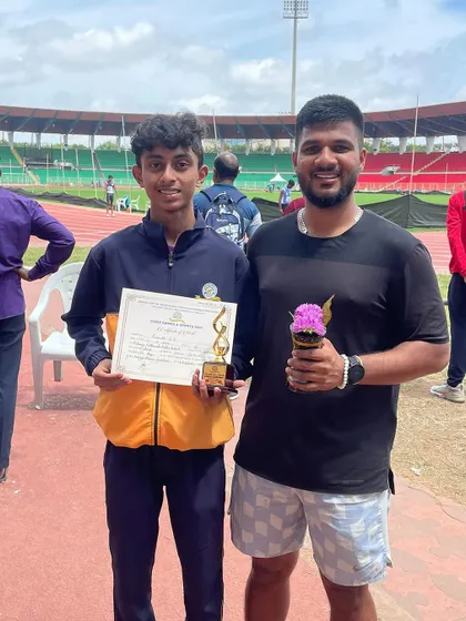 A bronze medal for endurance. Our athlete with his coach after a tough 3000m race.