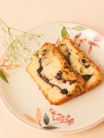 Sweet, tangy, and bursting with blueberry goodness. This Blueberry Swirl Tea Cake is a slice of summer in every bite.