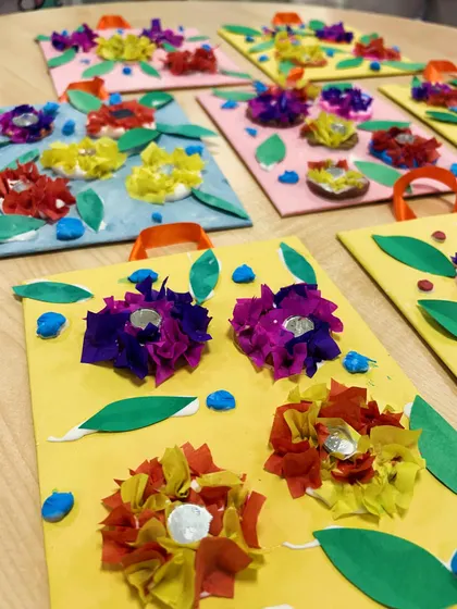 A simple and beautiful DIY craft using clay, paper, and sequins. My 5-year-olds created these lovely floral wall hangings.