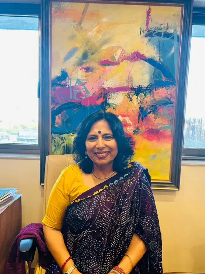 A moment of peace in my office. The art behind me is a source of inspiration, reminding me of the creativity and color we are fighting to protect in people's lives.