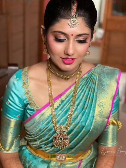 A close-up of the finished engagement look. The pink shimmery eyeshadow and matching lip color create a cohesive and romantic style.