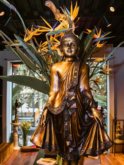 A stunning bronze Buddha statue taking center stage in our store. This is the kind of palatial finesse and versatile art that makes our studio a playground for designers, architects, and collectors.