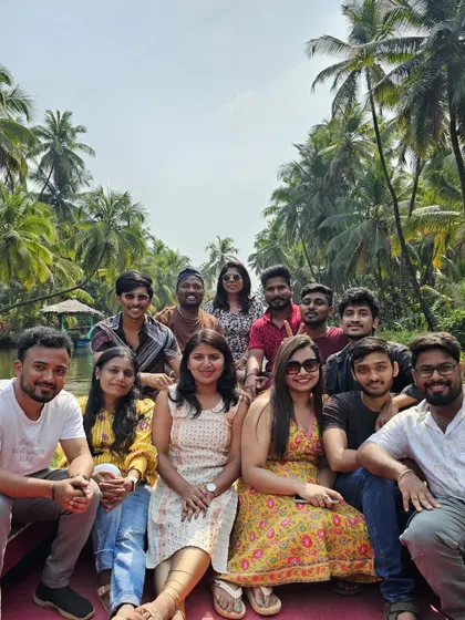 A happy group photo during the Honnavar backwater boating tour.