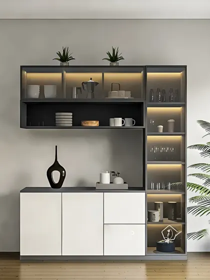 This modern crockery unit combines dark grey and white finishes. The glass-fronted display section is backlit, beautifully highlighting the items inside.