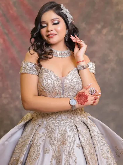 A beautiful engagement look in a silver gown, created by one of my students. The soft smokey eye and nude lip are perfect for a modern, elegant event.