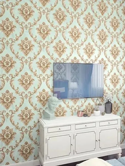 A living room with a light blue and brown damask wallpaper, adding a pop of color to the space.