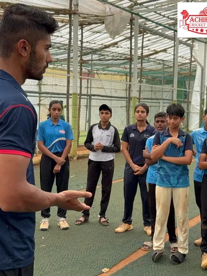 Aman Khan interacting with our girls' team, offering them tips and motivation. We ensure all our players, boys and girls, get access to mentorship from top professionals.