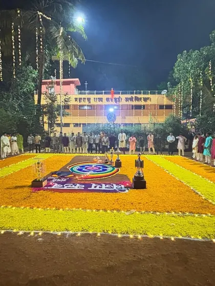 The beautiful setup for our annual Laxmi Pujan, with the Maharashtra State Kabaddi Association building in the background.