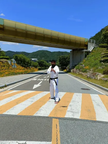 A moment of reflection on the crosswalk in Muju.