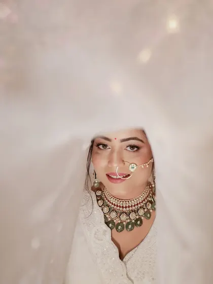 An artistic portrait using the veil to create a dreamy, cloud-like effect. We love experimenting to create unique bridal shots.