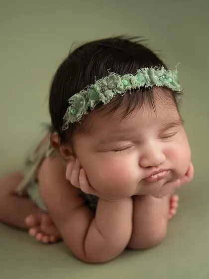 Another adorable pouty expression. Each baby has their own little personality, and I love capturing these unique moments.