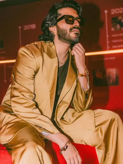 A candid shot of Harshvarrdhan Kapoor at the H&M event, looking effortlessly cool and stylish.