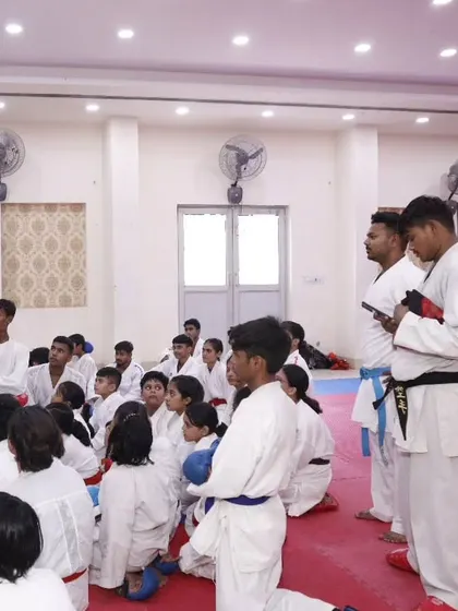 Students listening intently during the seminar. The path to becoming a champion involves being a dedicated student.