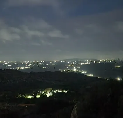 The view from Anthargange at night, with the city lights twinkling in the distance.