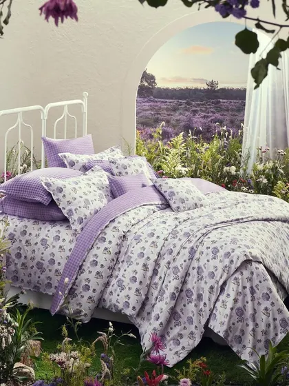 A product-focused version of our lavender field set. This shot allows the customer to see the full bedding collection in a beautifully styled, thematic context.