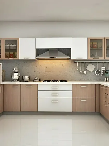 A classic U-shaped kitchen layout with a two-tone design. The combination of light wood and white cabinets creates a timeless look, with glass-front upper cabinets for display.