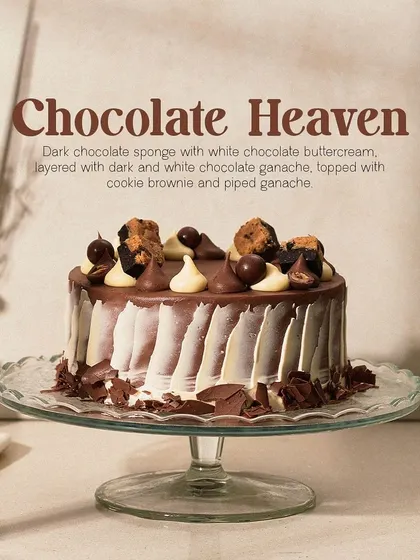 My Chocolate Heaven cake is a dream for those who love variety. It features dark chocolate sponge, white chocolate buttercream, and is topped with chunks of cookie brownie and piped ganache.