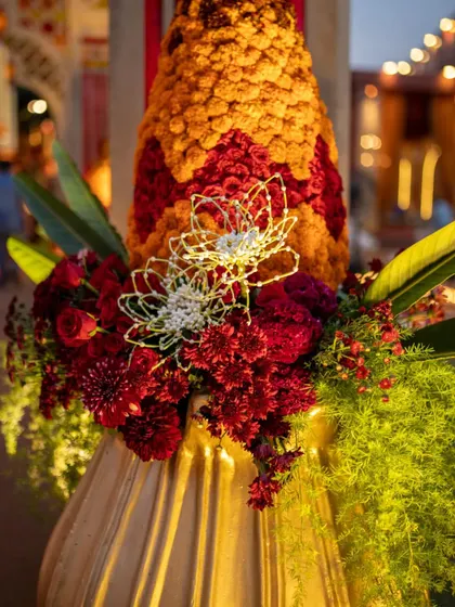 A detailed shot of the wired lotus flower, made from individual jasmine buds. This is an example of the highly skilled and artistic techniques we employ in our traditional floral designs.