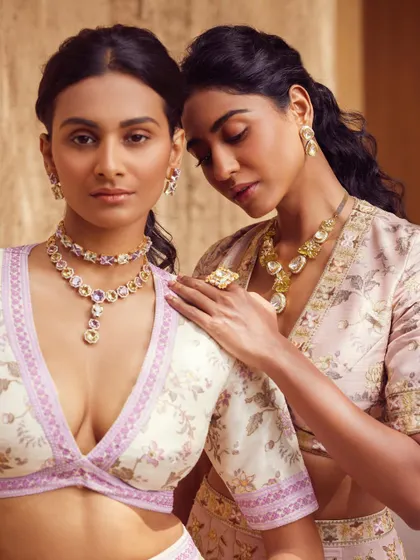 A beautiful shot focusing on the delicate pastel gemstone necklaces worn by two models. This shows how I coordinate jewellery for bridesmaids or family members to complement each other.