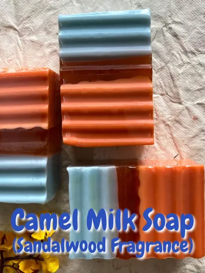 This version of the Sandalwood fragrance soap uses a simple but striking color-blocking of orange, blue, and a hint of brown.