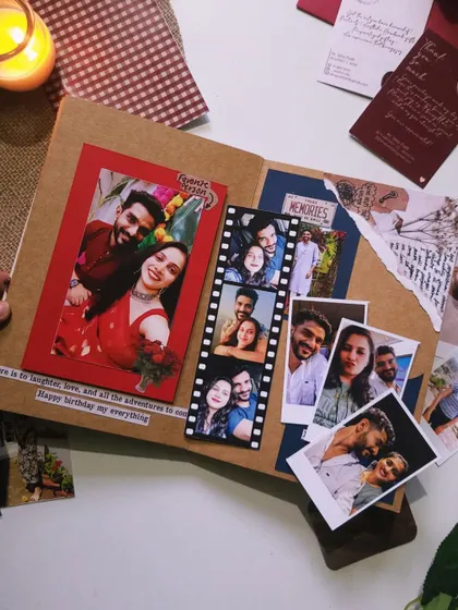 A closer look at a page from a custom flap book. I used a filmstrip-style photo layout and layered different papers to create a dynamic, scrapbook feel. Every detail is designed to bring your memories to life.