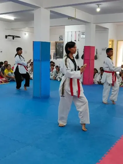An instructor walks through the class during practice.