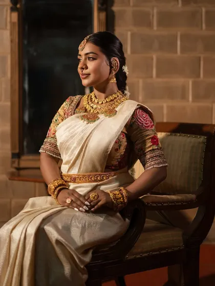 A seated portrait that exudes timeless beauty and sophistication.