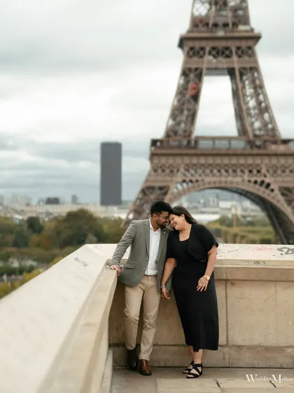 An intimate moment of connection for Varun and Aishwarya, with the Paris skyline in the background. It’s about finding your own private world, even in a bustling city.