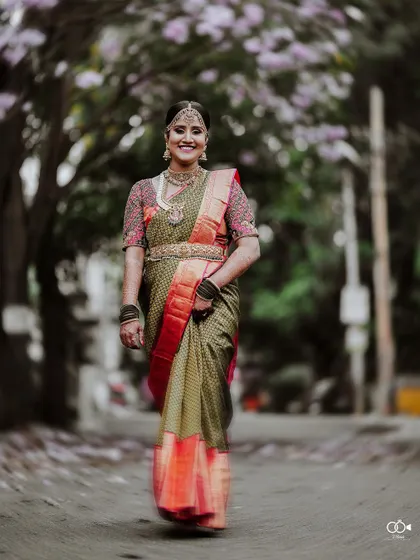 A duplicate of the beautiful bridal portrait on the flower-strewn path.