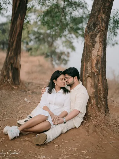Finding comfort and peace in each other's company. Nutan and Shubham share a quiet moment under a tree, a simple yet powerful image of their bond.