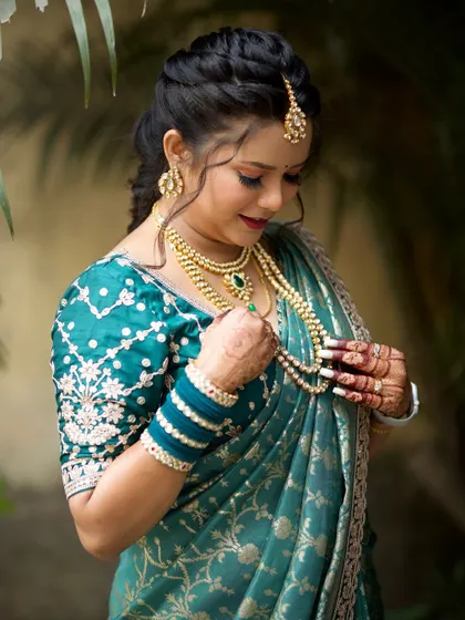A stunning bride in her traditional attire, with my mehendi adding to her 'shringaar' (adornment).
